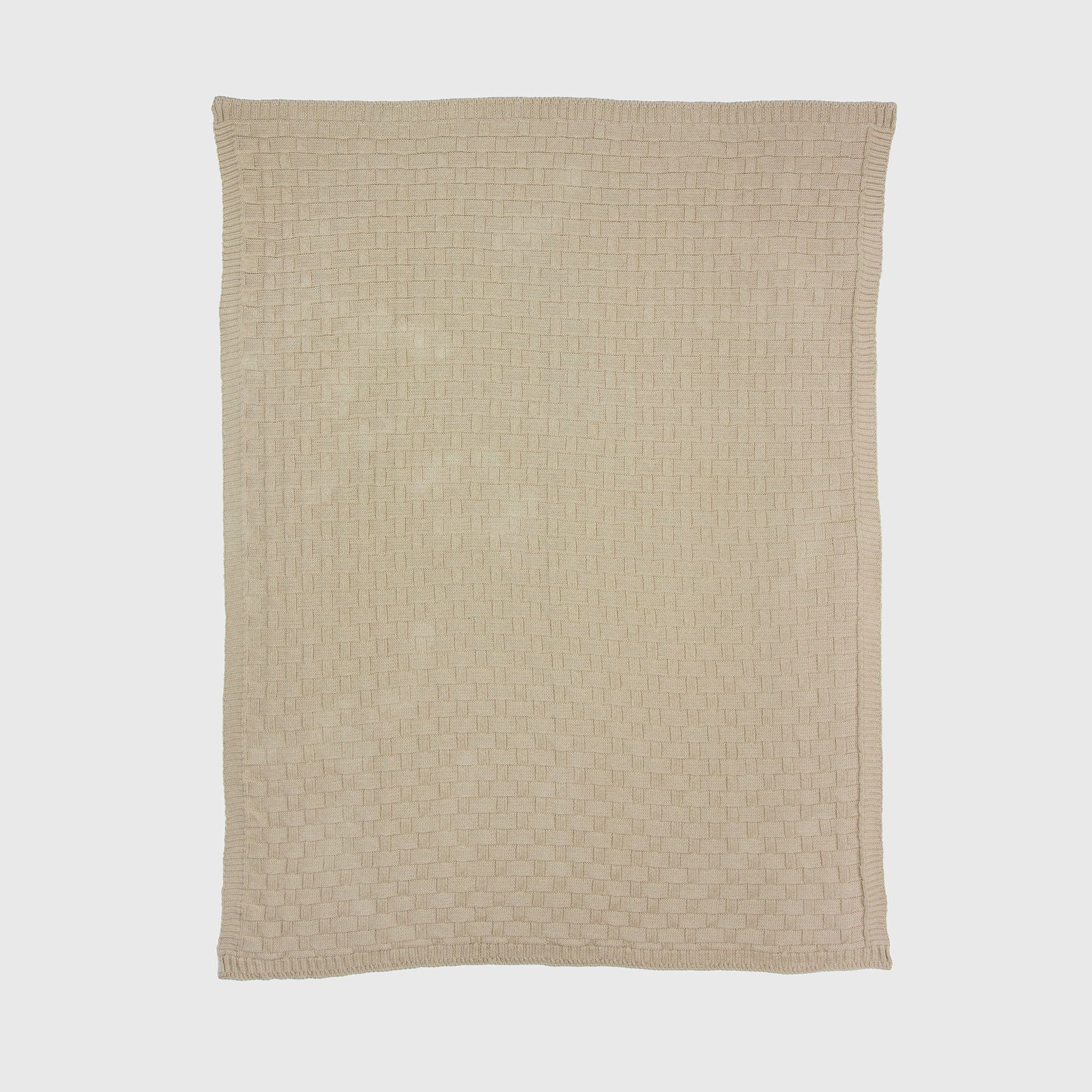 The in2green Basketweave Throw Blanket is a beige, rectangular throw with a subtle checkered pattern made from recycled yarns, shown flat on a white background.