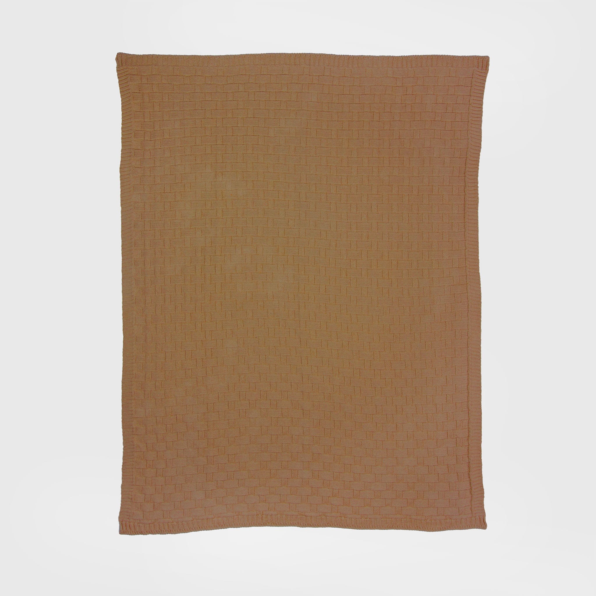 The in2green Basketweave Throw Blanket, rectangular and light brown, made from sustainable recycled yarns, is displayed flat on a white background.