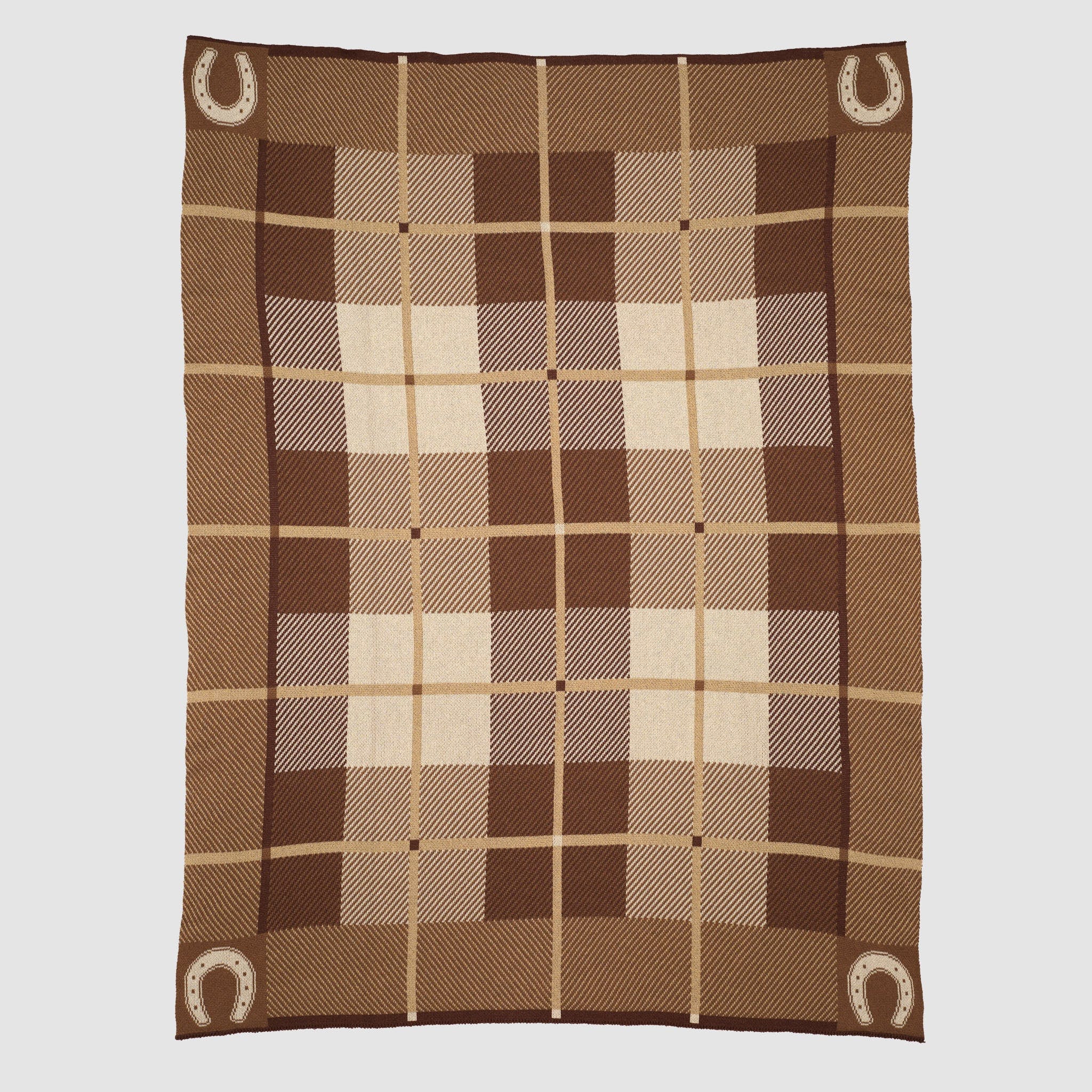 Orange plaid blanket with horsehoes in the corners