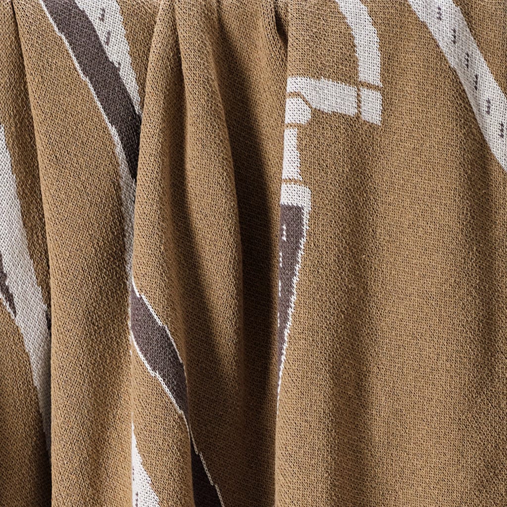 Close-up of beige and brown Equestrian Tack Throw Blanket