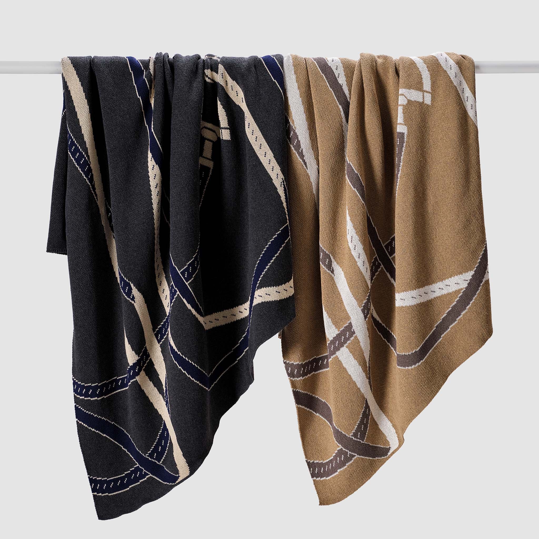Two Equestrian Tack Throw Blankets in grey and beige.