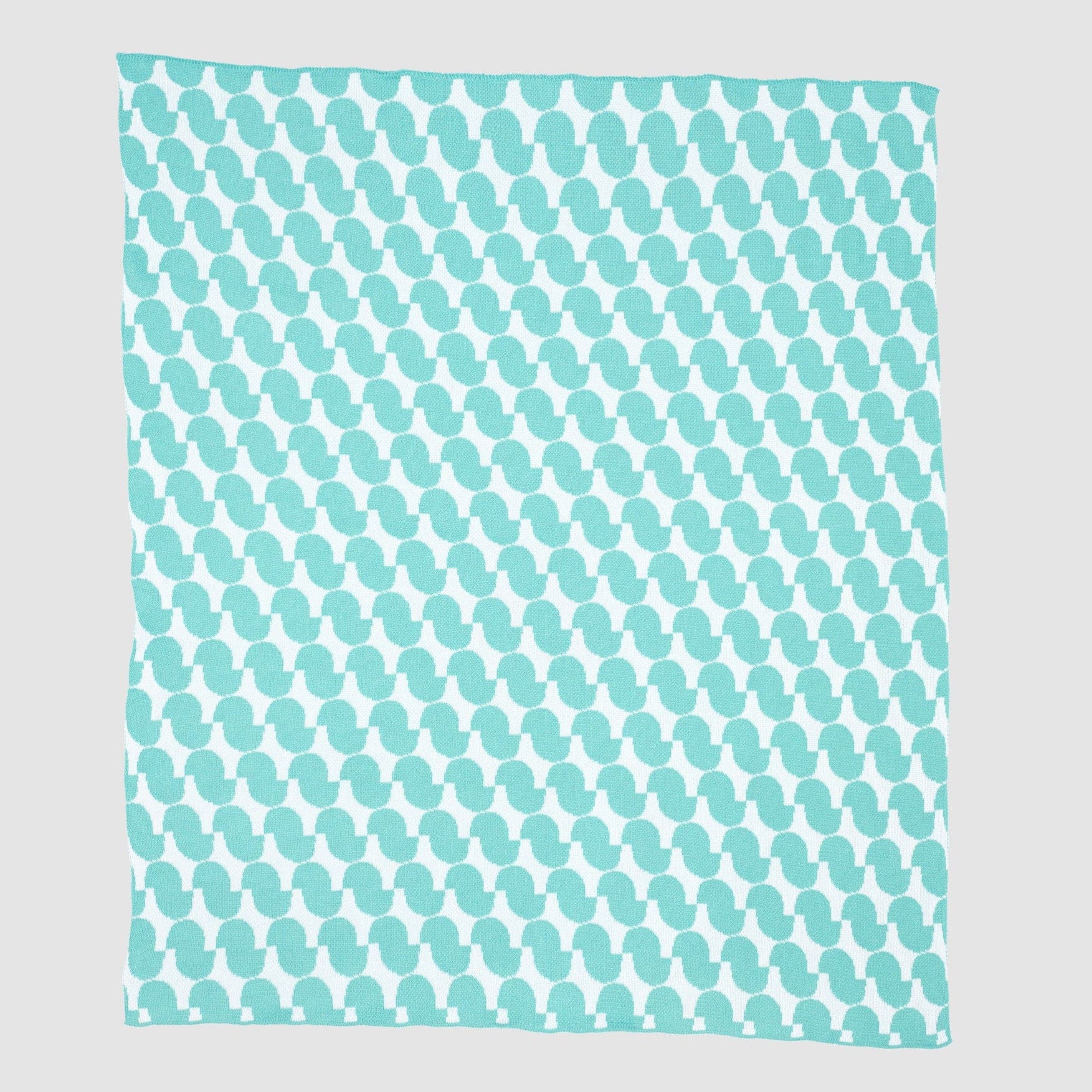 The Poly Juki Throw Blanket by Petra Kaksonen features a rectangular shape with turquoise and white penguin silhouettes in a repeating pattern on a light gray background, inspired by minimalist Scandinavian design.
