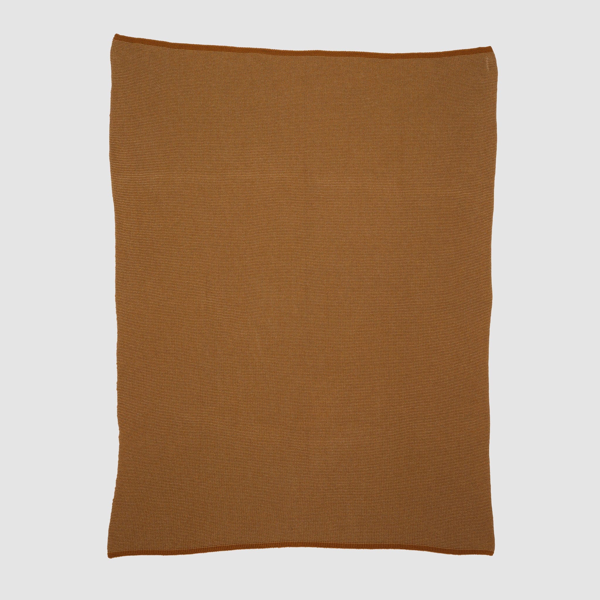The in2green Wool Cardigan Throw Blanket, a plain rectangular brown wool piece, is displayed flat on a white background.