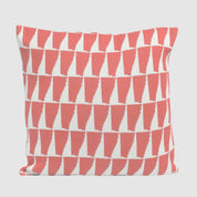 Add Nordic flair to your coastal decor with the Poly Tikku Pillow by Petra Kaksonen for in2green, featuring a bold geometric pattern of red and white triangles arranged in rows on a plain background.