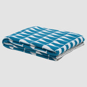 Poly Tikku Throw Blanket by Petra Kaksonen