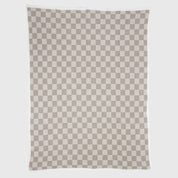 The in2green Gingham Plaid Throw Blanket features a repeating beige and white checkered pattern and is shown against a plain white background.
