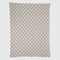 The in2green Gingham Plaid Throw Blanket features a repeating beige and white checkered pattern and is shown against a plain white background.