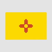 The image showcases the Hometown Pride Flag - Cotton Sustainable Knit Blanket by in2green, featuring the New Mexico state flag’s iconic red Zia sun symbol on a yellow background. Expertly crafted in the USA from recycled cotton, this eco-friendly blanket combines comfort with bold state pride.