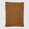 The in2green Wool Cardigan Throw Blanket, a plain rectangular brown wool piece, is displayed flat on a white background.