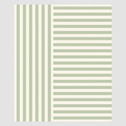 The image showcases in2green's Coastal Stripes Throw Blanket, featuring a seaside-inspired design with green and white vertical stripes on the left and horizontal ones on the right, ideal for a beach house.