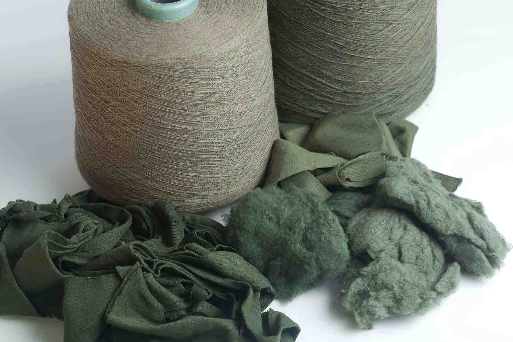 Excess cotton that is recycled into yarn that can be used to knit new blankets.