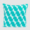 The Poly Juki Pillow by Petra Kaksonen for in2green features a Nordic-inspired turquoise geometric pattern on white and is made from recycled plastic bottles—an eco-friendly, stylish outdoor pillow.