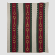 The Striped Horse Bit Throw Blanket by in2green is part of the Equestrian Collection and features vertical stripes in beige, green, and red. Made from recycled cotton, its eco-friendly design showcases red stripes with a unique chain pattern reminiscent of a horse bit.